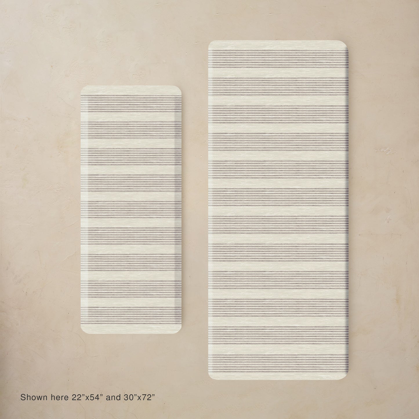Two rectangular mats with striped patterns on a beige background