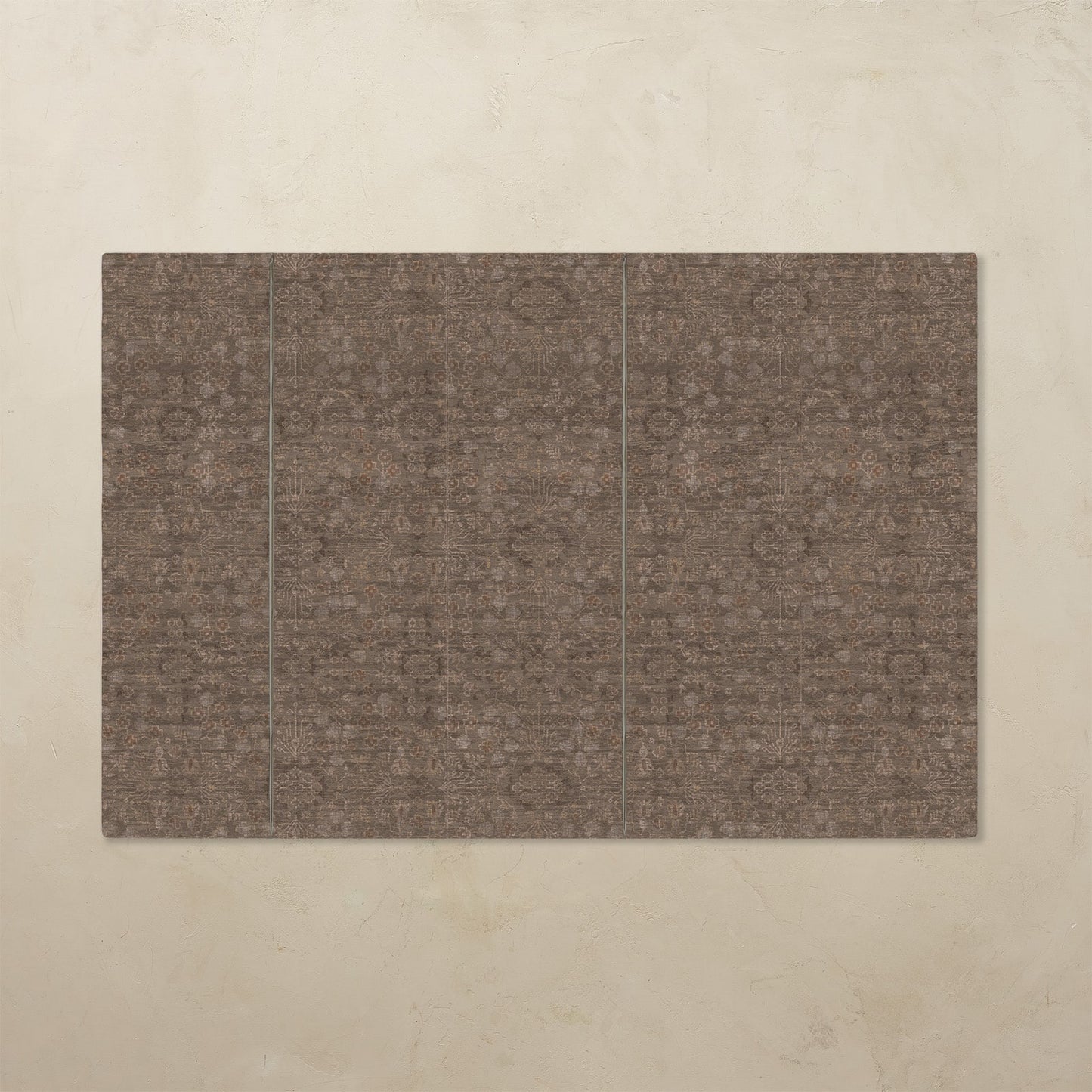 Brown rectangular mat with a subtle pattern on a beige background