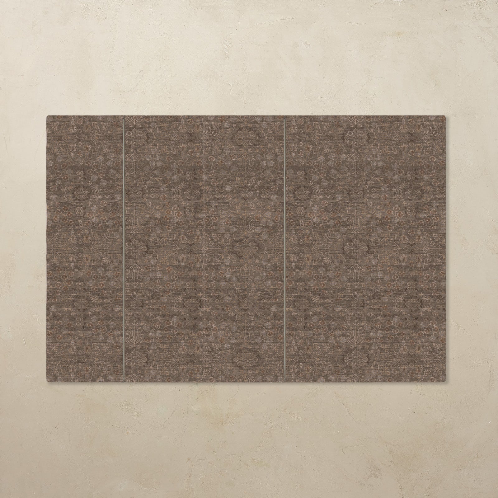 Brown rectangular mat with a subtle pattern on a beige background