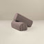 Two cylindrical armrests with striped pattern on a beige background