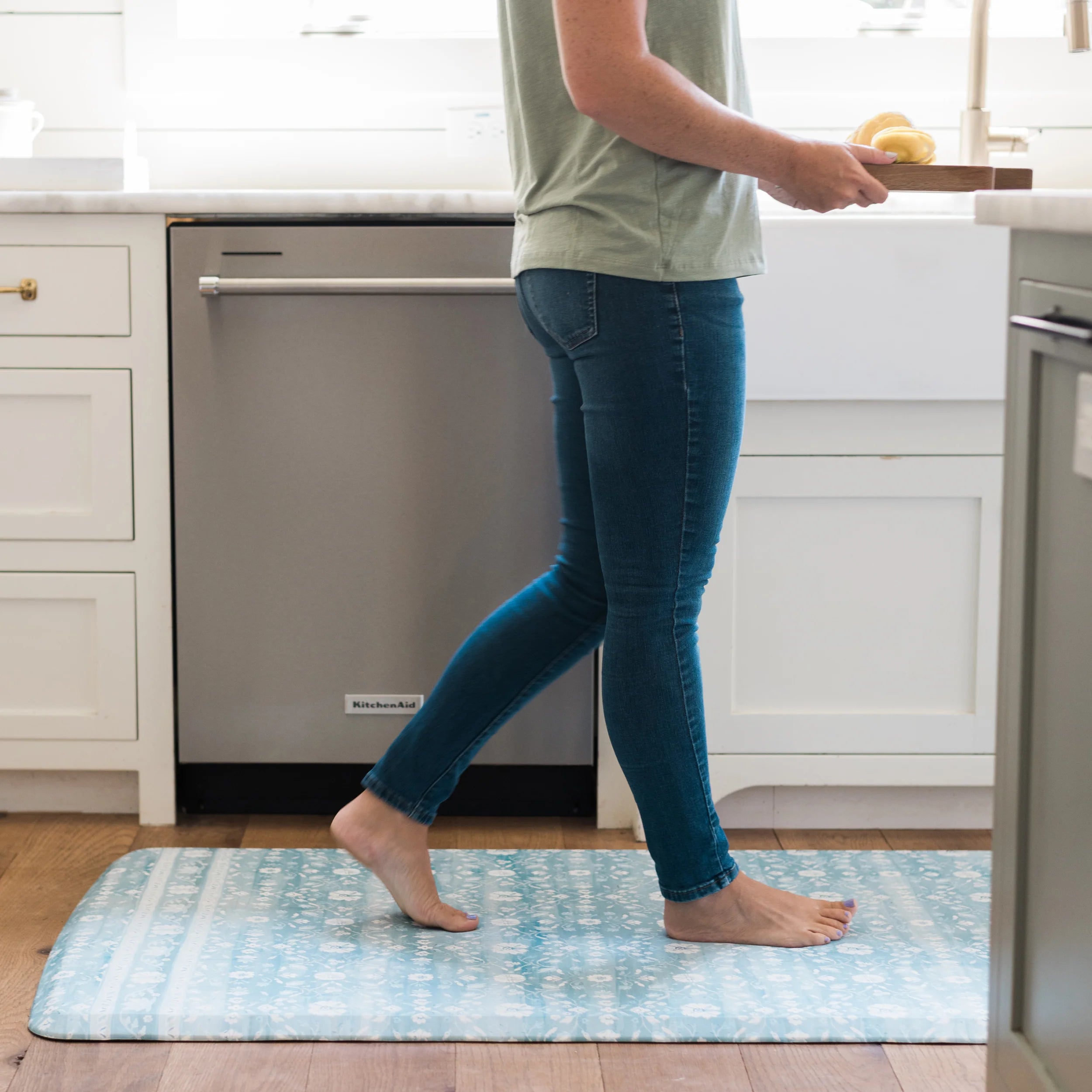 Nama standing mat Gemma Sea blue in kitchen with woman shown in size 30x108