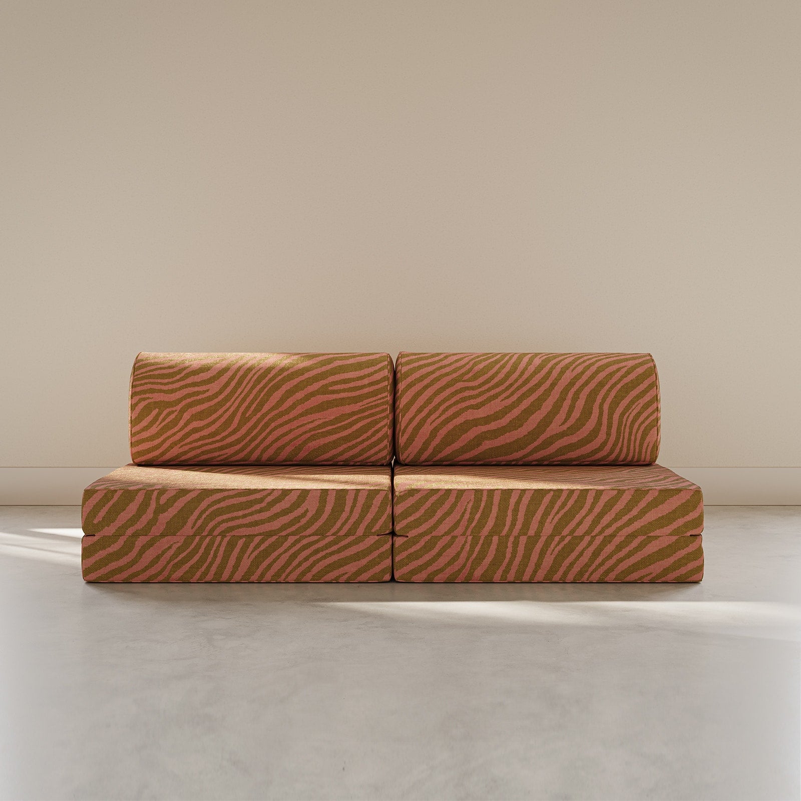Modular sofa with zebra pattern on a plain background