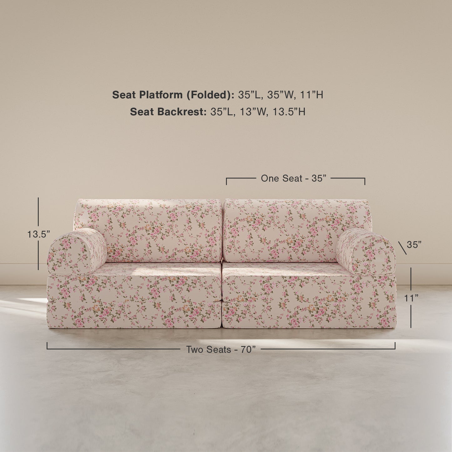 Floral-patterned sofa with dimensions on a plain background