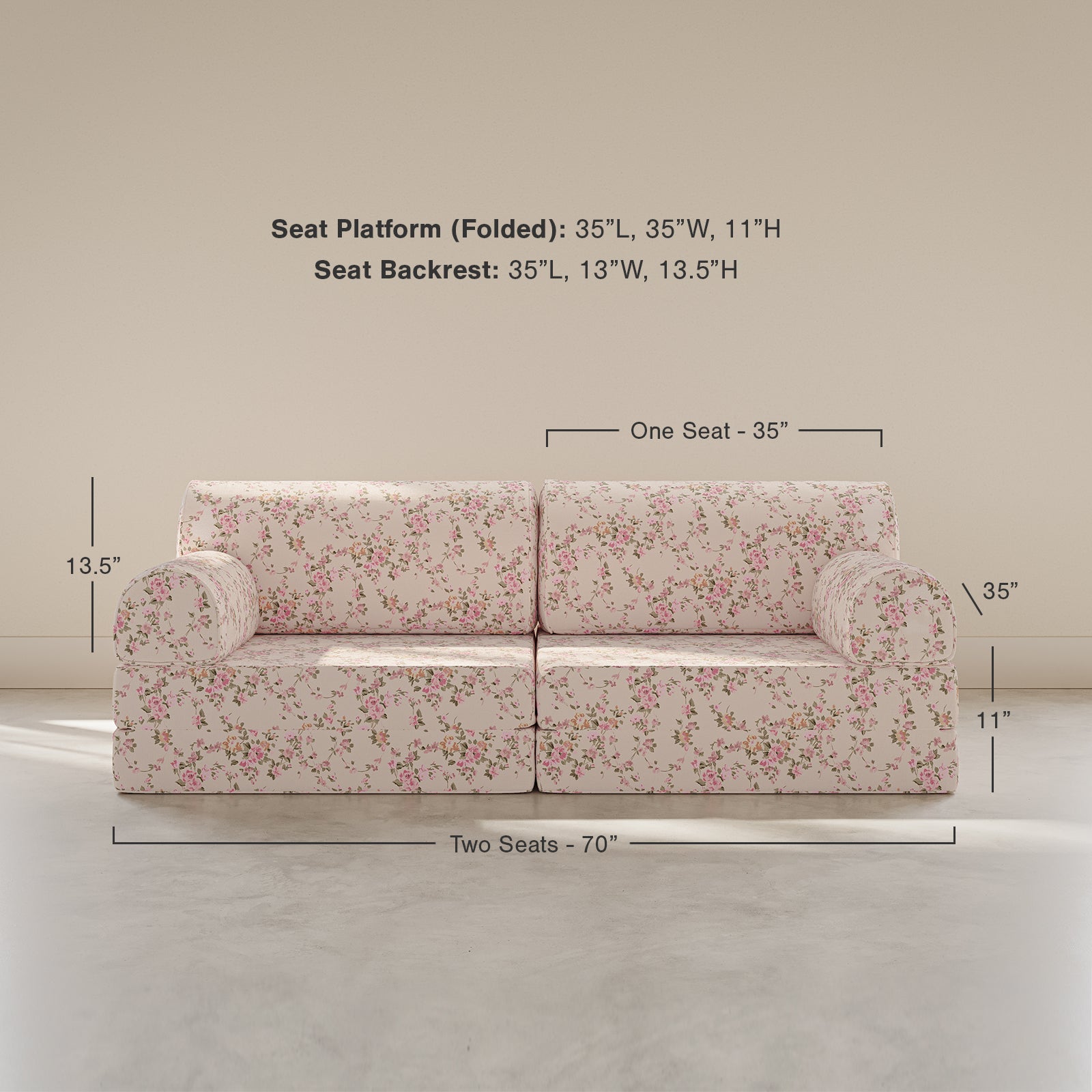 Floral-patterned sofa with dimensions on a plain background