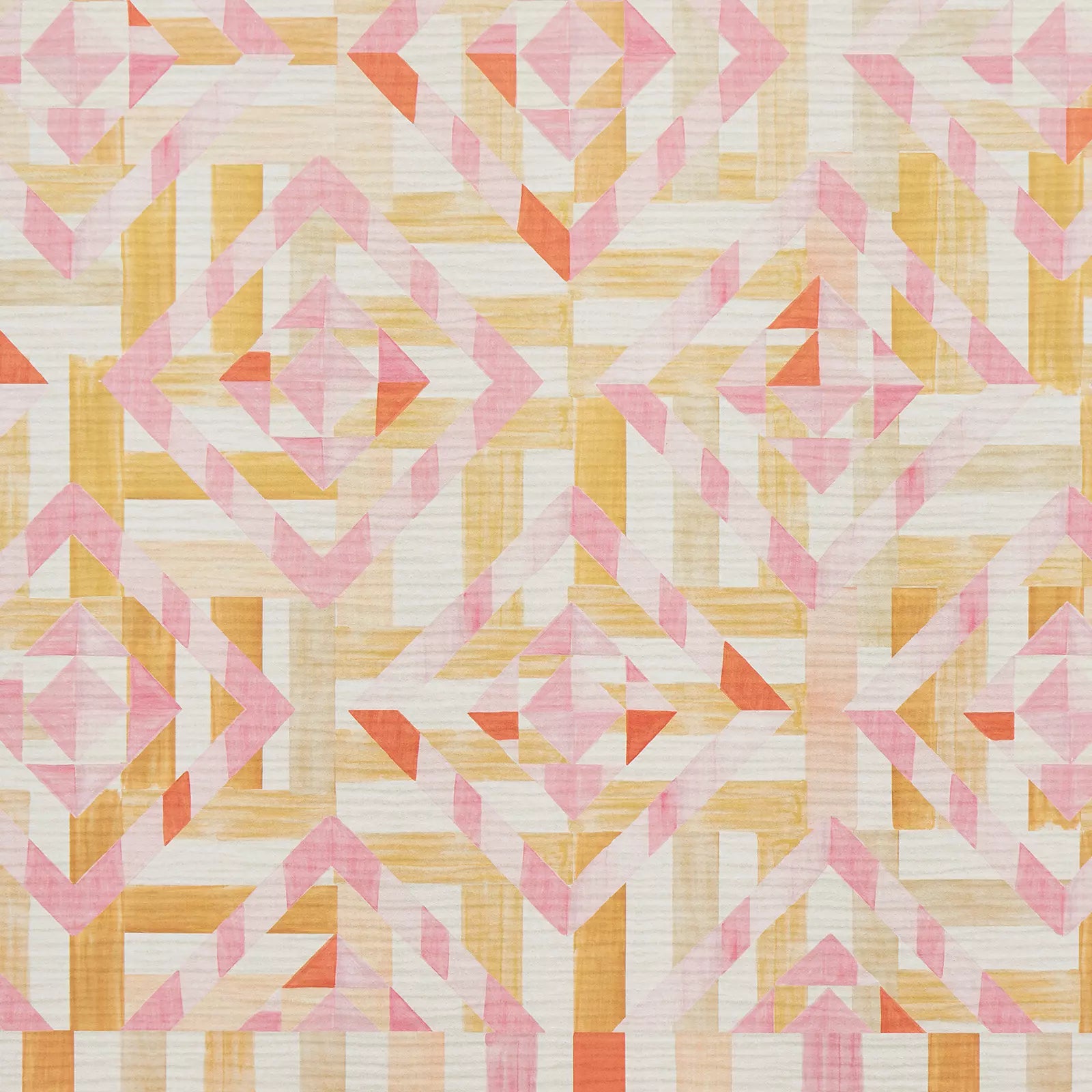 Detailed shot of the yellow orange and pink quilt pattern of the Freya sunshine portable play mat 