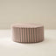 Striped ottoman on a plain background