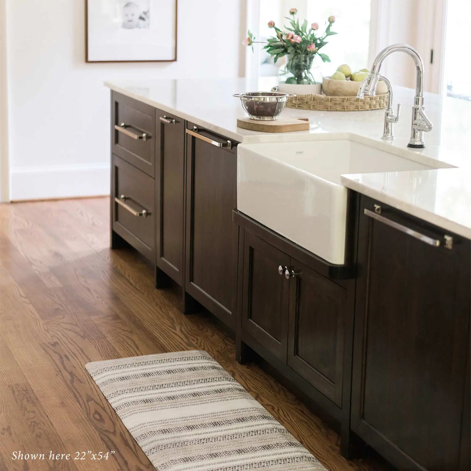Tan and black neutral boho stripe standing mat shown in kitchen in size 22x54