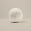 Round fabric ball with floral pattern on a beige background