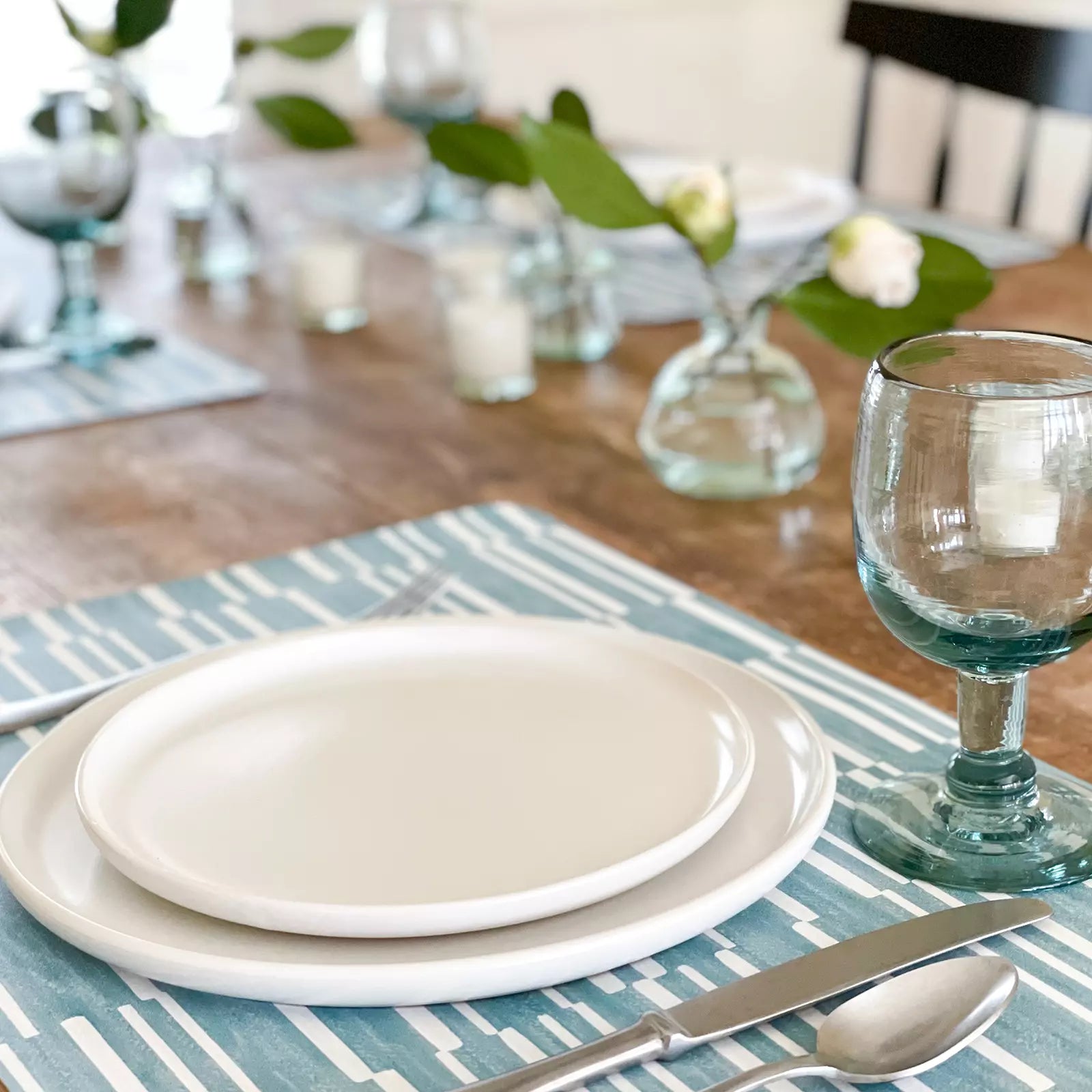 Nara Turquoise Blue Striped place mat with plate, napkin and silverware