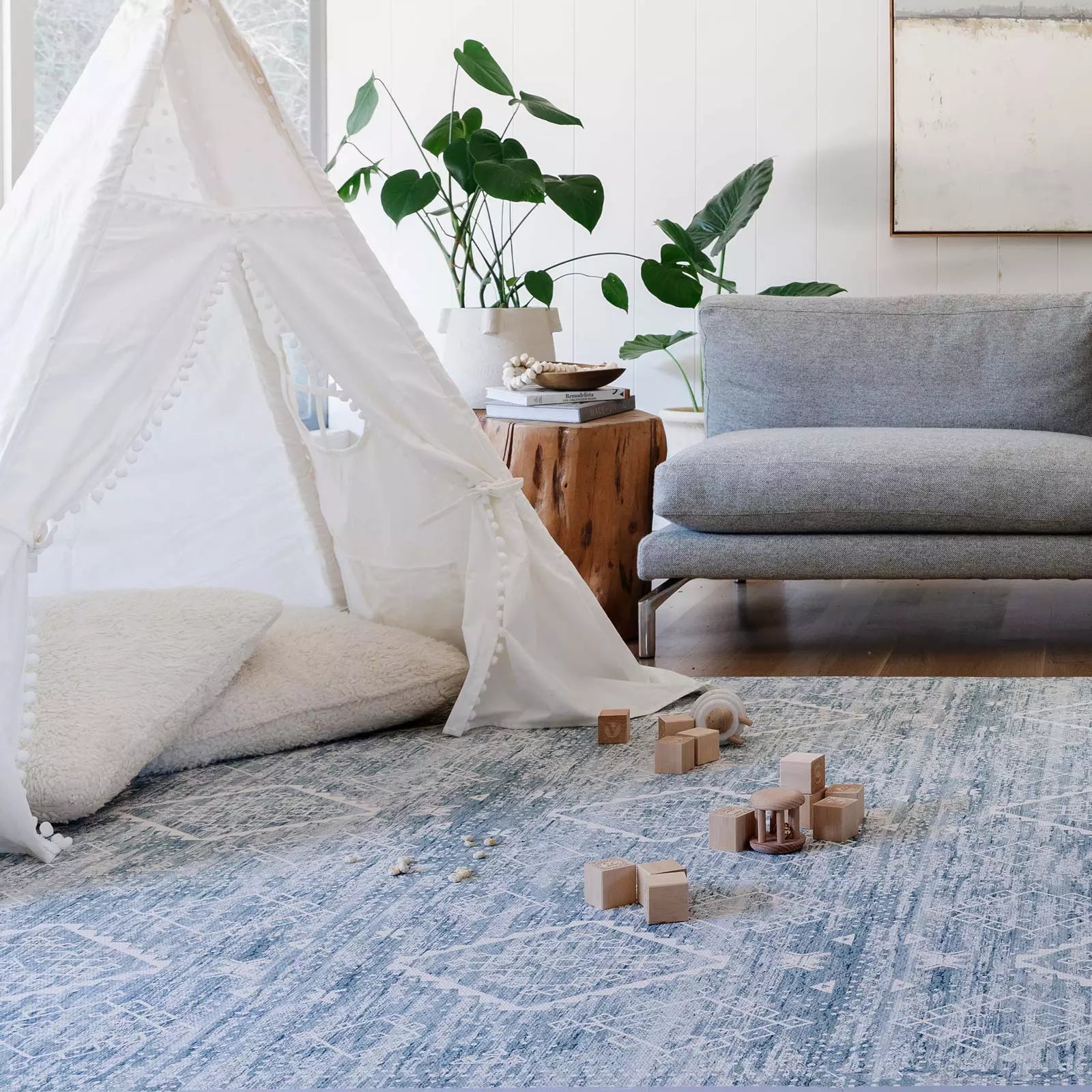 Indigo Blue Minimal Boho Pattern play mat shown in living room with tipi