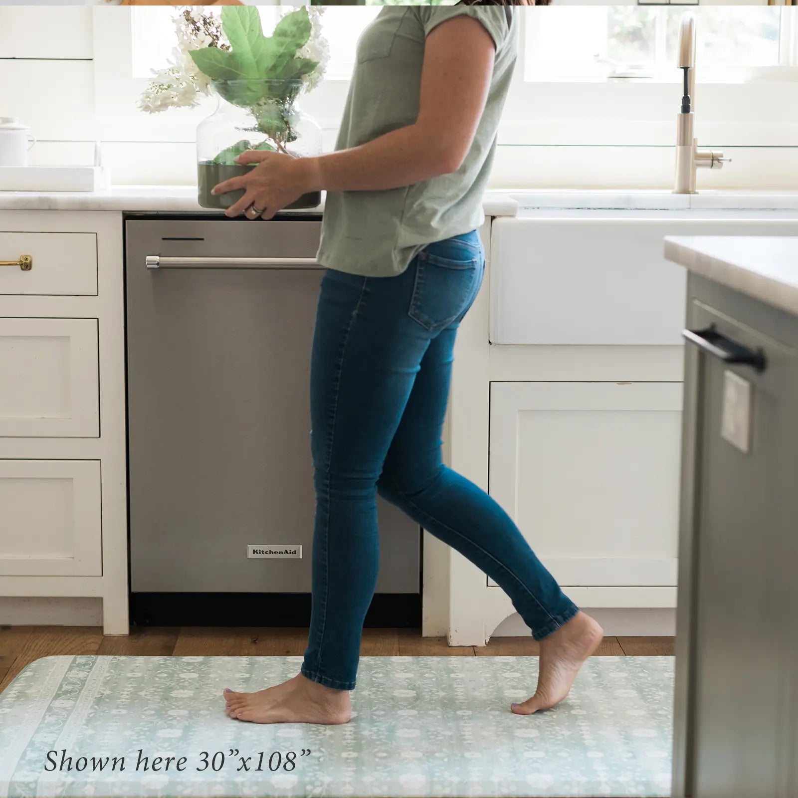 Nama standing mat Gemma white sage green floral in kitchen with woman shown in size size 30x108