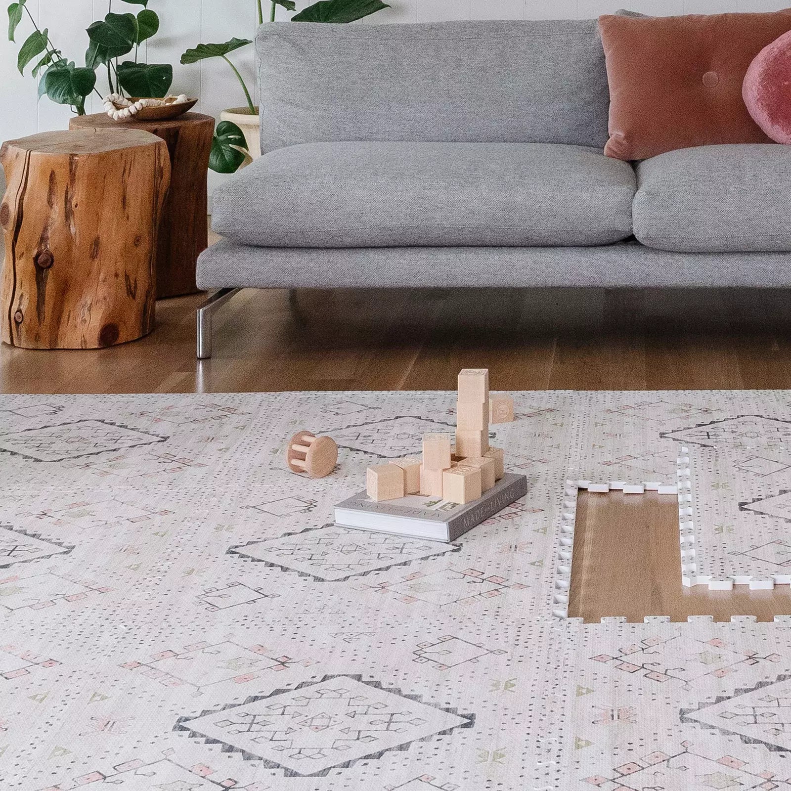 Oat Neutral Beige Minimal Boho Pattern play mat in living room with tile removed