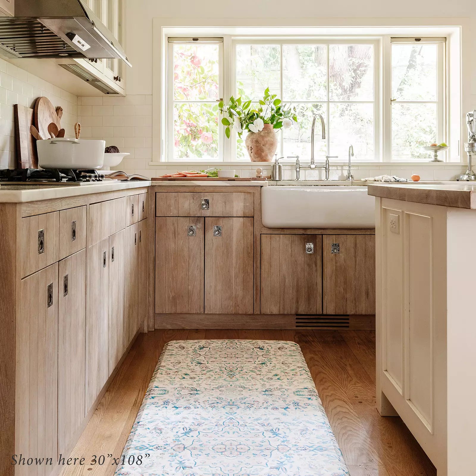 Emile Pale Aqua Muted Blue Pink Floral Boho Standing Mat in kitchen shown in size 30x108