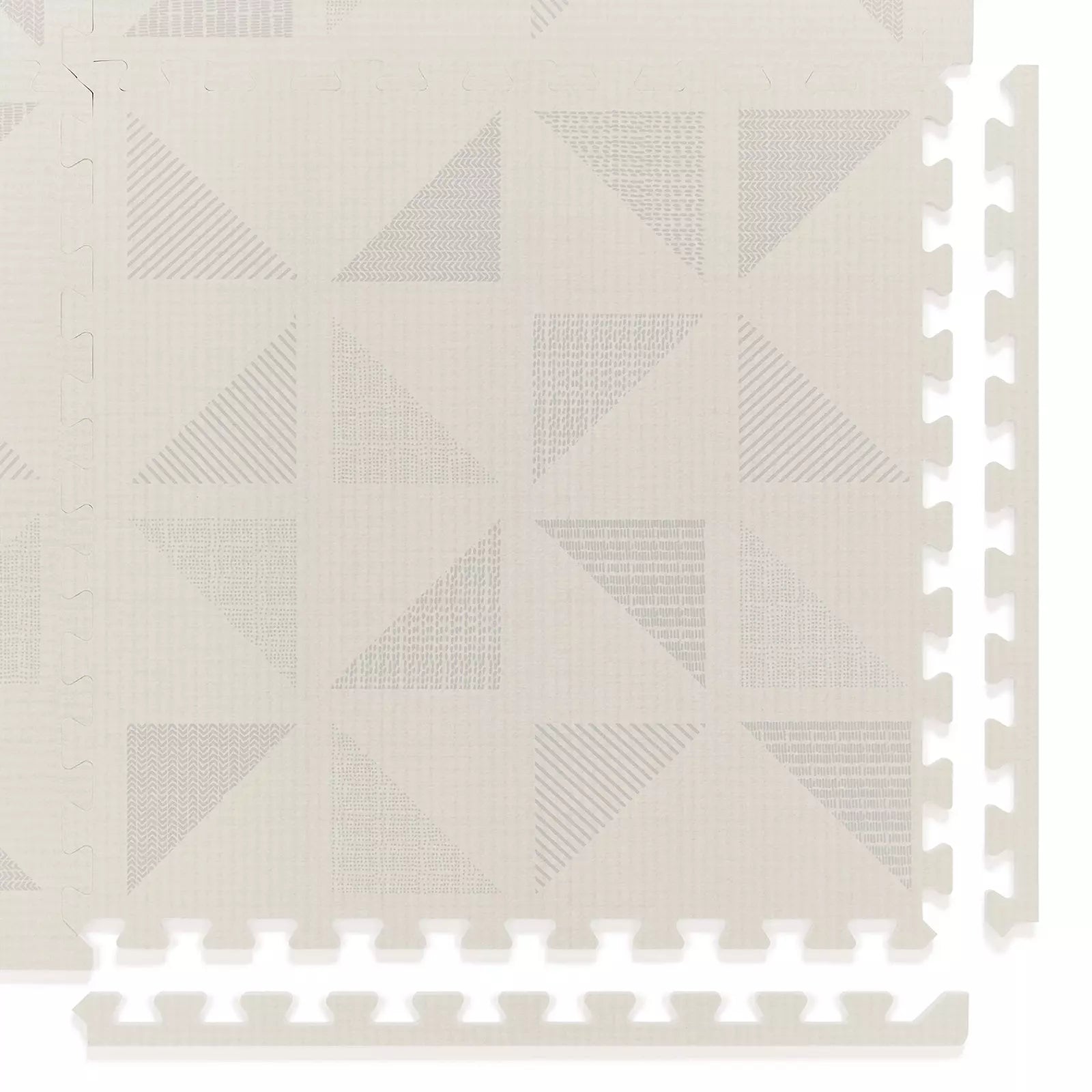 Terrazzo neutral cream geometric baby play mat, close up shot of square tile.
