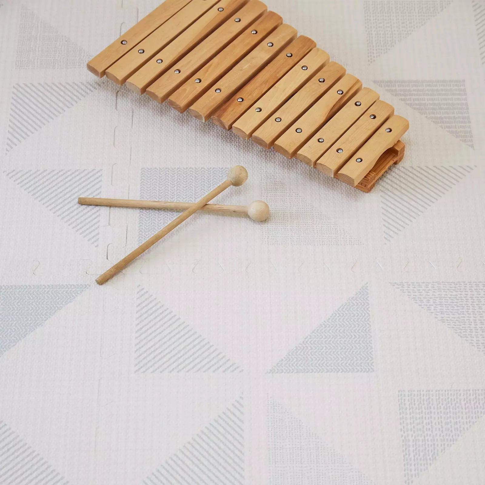 Terrazzo cream geometric play mat with xylophone